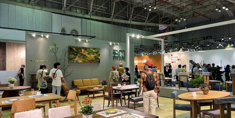 Customers explore furniture products at a fair. Photo by The Investor/Lien Thuong.