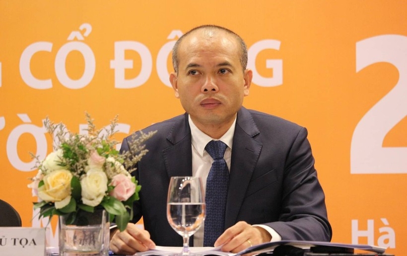 Nguyen Phi Hung at a shareholder meeting of PGBank. Photo courtesy of Vietimes.
