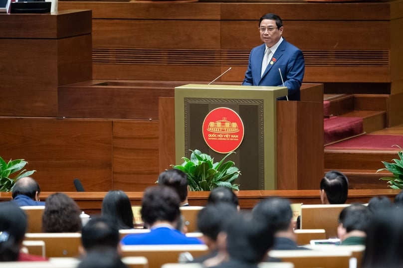 PM Pham Minh Chinh delivers a socio-economic report at the National Assembly plenary meeting in Hanoi, October 23, 2023. Photo courtesy of the government's news portal.