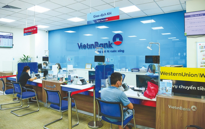Customers make transactions at a VietinBank office. Photo courtesy of the bank.