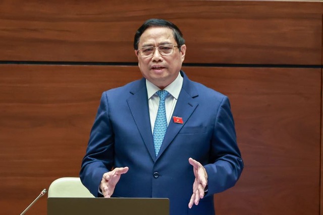Prime Minister Pham Minh Chinh answers questions from legislators at a National Assembly plenary session on November 8, 2023. Photo courtesy of the government's news portal.