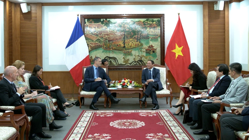 French Ambassador to Vietnam Olivier Brochet (left) and Minister of Culture, Sports and Tourism Nguyen Van Hung at a meeting in Hanoi, November 13, 2023. Photo courtesy of the ministry.