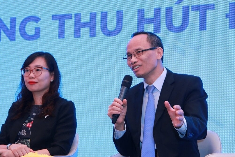 Vuong Thi Minh Hieu (left), deputy head of the Economic Zones Department under the Planning and Investment Ministry, and Can Van Luc, chief economist at Hanoi-based bank BIDV, at a panel discussion of the Vietnam Industrial Park Forum 2023: Towards Green Growth in Ho Chi Minh City, November 16, 2023. Photo by The Investor/Le Toan.