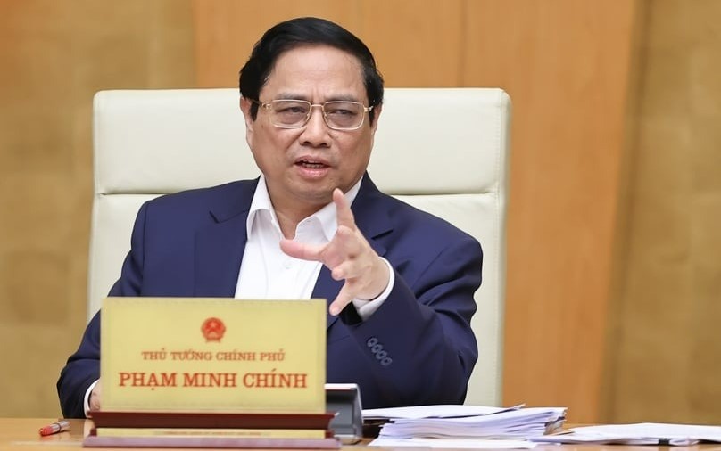 Prime Minister Pham Minh Chinh addresses a regular cabinet meeting in Hanoi on December 6, 2023. Photo courtesy of the government's news portal.