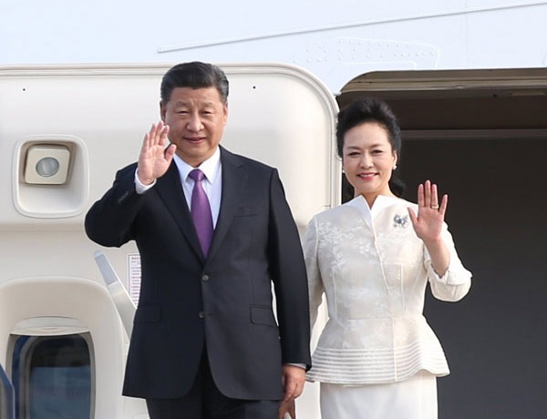 President Xi Jinping and his wife, Peng Liyuan, wave after arriving at Tegel Airport in Berlin, Germany, September 2017, for a state visit. Photo courtesy of Xinhua.
