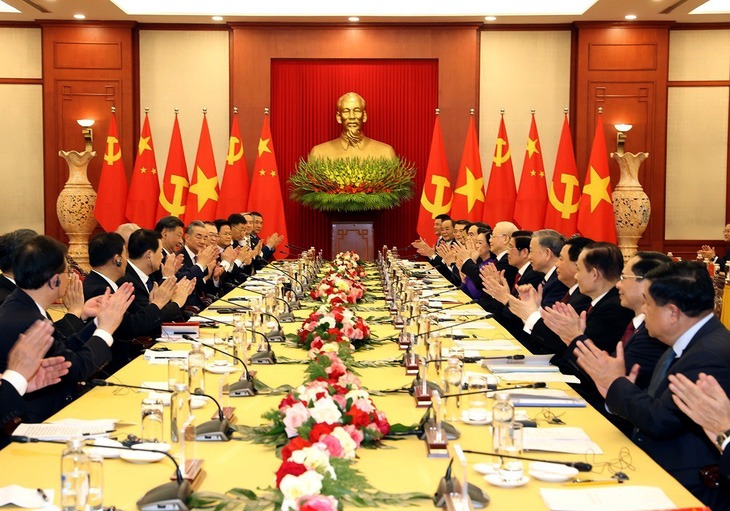 Vietnam's Party General Secretary Nguyen Phu Trong and China's Party General Secretary and President Xi Jinping during official talks in Hanoi, December 12, 2023. Photo courtesy of Vietnam News Agency.