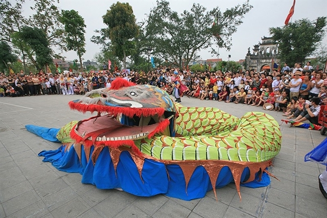 The ‘Diet Giao Long’, literally means ‘Killing Snake Devil’, is a performance presenting the tale about the village saint. Photo courtesy of Vietnam News Agency.