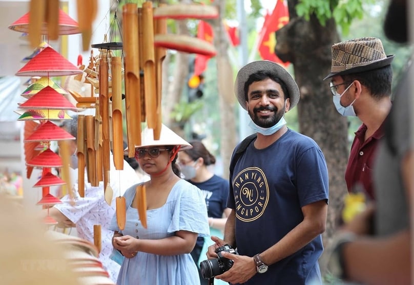 Indian tourists on a street in Hanoi. Photo courtsy of Vietnam News Agency.