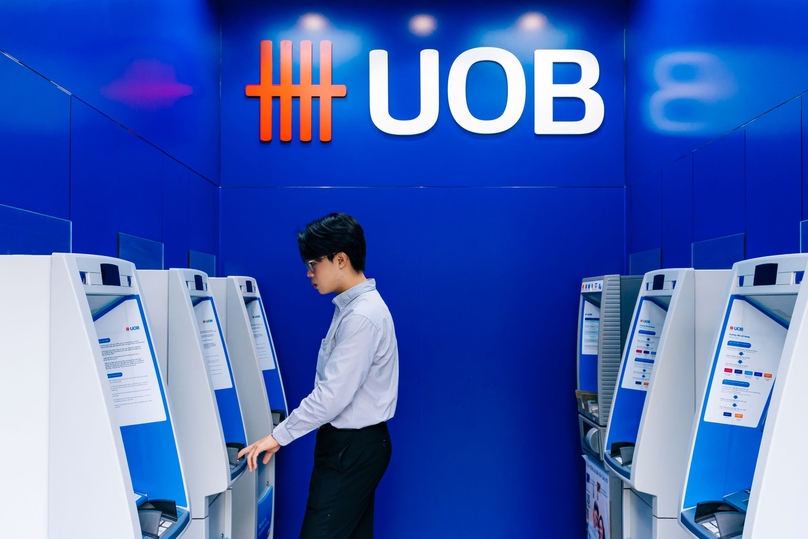 A customer conducts a transaction at a UOB Vietnam ATM. Photo courtesy of the bank.