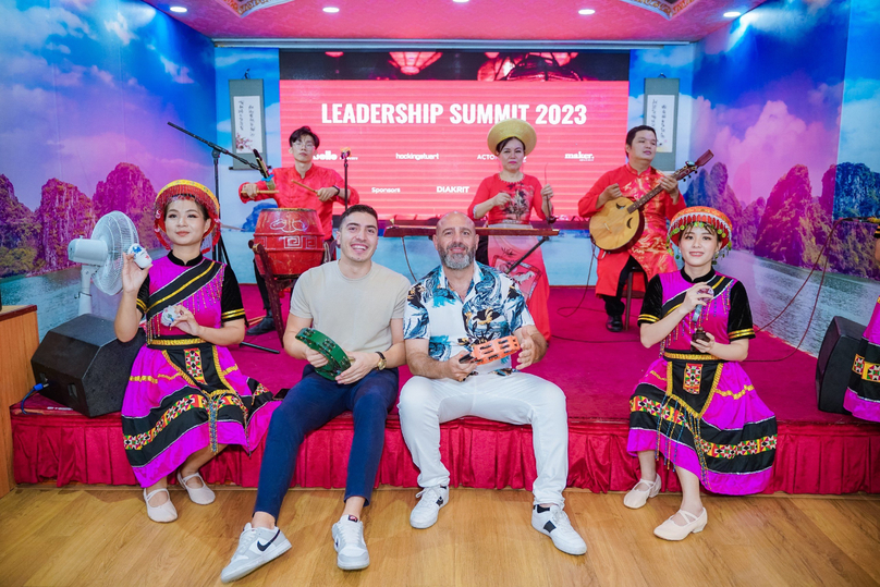 Foreign tourists participate in a Vietnamese music performance on Indochina Queen, which offers Saigon River cruises. Photo courtesy of Indonchina Junk.