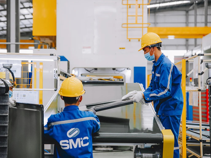 SMC workers check steel products. Photo courtesy of the company.