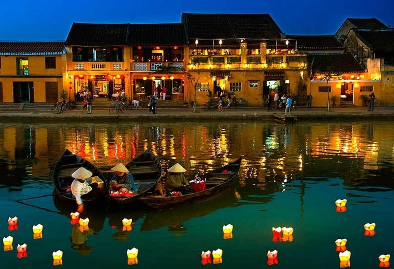 People release lanterns onto Hoai River in the ancient town of Hoi An, central Vietnam. Photo courtesy of iViVu