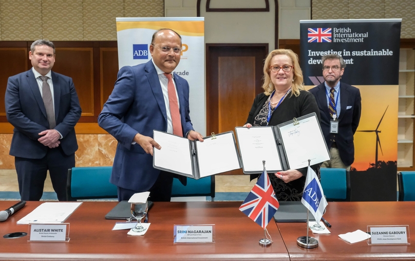 Representatives of British International Investment (BII) and the Asian Development Bank (ADB) sign a risk-sharing agreement to support green trade transactions in the Asia-Pacific region, January 18, 2023. Photo courtesy of BII.