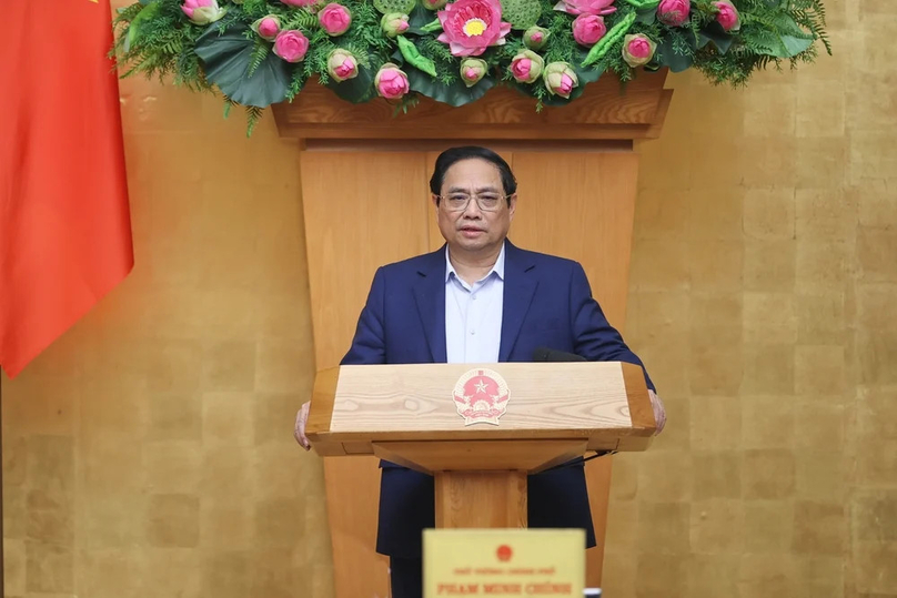 Prime Minister Pham Minh Chinh chairs the government’s January 2024 regular meeting. Photo courtesy of the government's news portal.