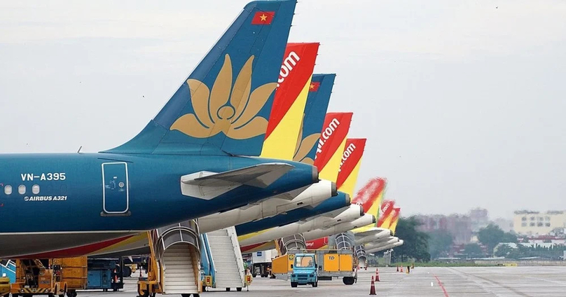 Vietnamese airlines' planes at an airport. Photo courtesy of Tai chinh & Tien te (Finance & Monetary) magazine.