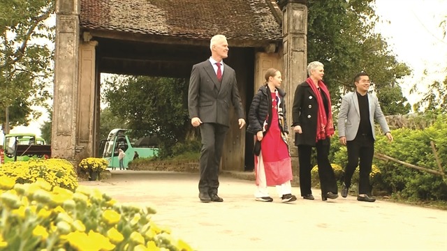Norwegian Ambassador Hilde Solbakken (second from right) and her family visit the ancient village of Duong Lam on the outskirts of Hanoi. Photo courtesy of the embassy.