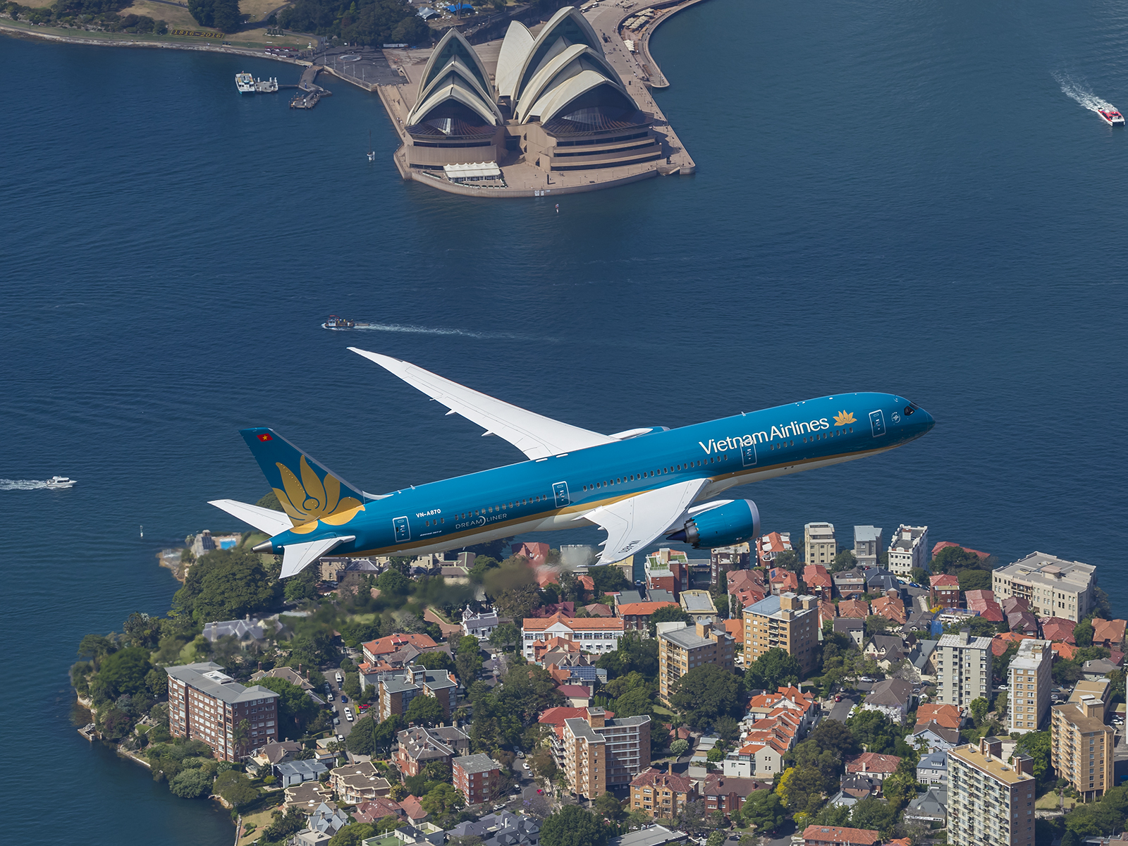 A Vietnam Airlines aircraft flies over Sydney. Photo courtesy of Vietnam Airlines.