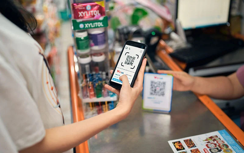 QR code payments sharply increased in January 2024. Photo courtesy of Nhan dan (People) newspaper.