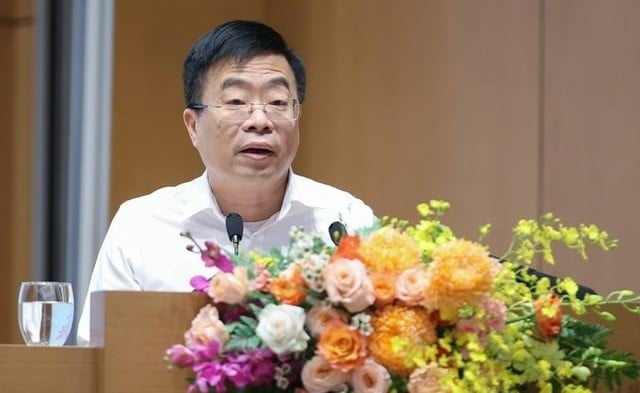 Le Tien Truong, chairman of Vietnam's largest garment maker Vinatex, speaks at a conference on monetary policy management to facilitate production and business in Hanoi, March 14, 2024. Photo courtesy of the government's news portal.