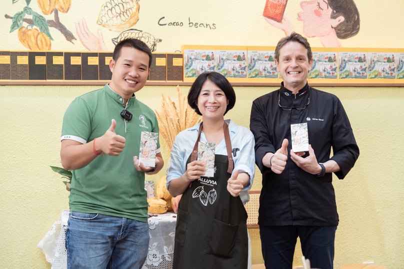 Nguyen Ngoc Diep, director of Xuan Ron Cho Gao Cocoa Co., Ltd (center), and French chocolate specialist Olivier Nicod (right) at Alluvia shop in Ho Chi Minh City, March 16, 2024. Photo courtesy of Alluvia.