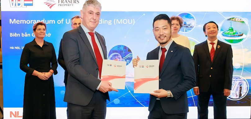 Geert Jakobs (front, left), CEO VDL ETG, and Edwin Tan (front, right), deputy CEO Frasers Property Vietnam, with the MoU in Hanoi on March 19, 2024. Photo courtesy of VDL ETG.