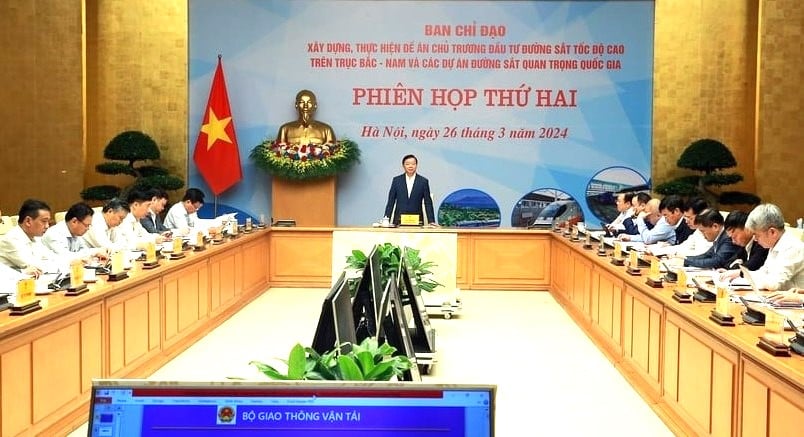 Deputy Prime Minister Tran Hong Ha (standing) speaks at a meeting of the steering committee for the North-South high-speed railway and key national railways projects, Hanoi, March 26, 2024. Photo courtesy of the government's news portal.