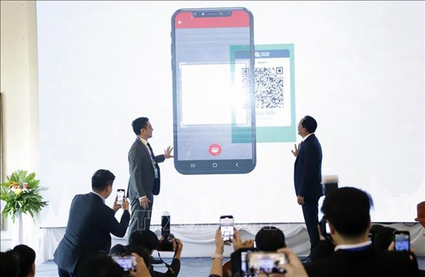  Laos and Thailand launch the cross-border QR payment linkage at a ceremony held in northern Laos' Luang Prabang province on April 3. Photo courtesy of Vietnam News Agency.  