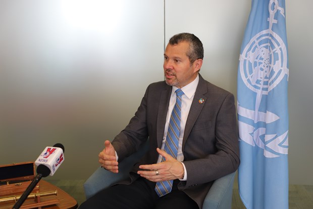 IMO secretary general Arsenio Dominguez grants an interview to Vietnam News Agency reporters in London. Photo courtesy of Vietnam News Agency.