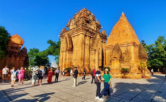 Tourists visit the Ponagar towers in Khanh Hoa province, south-central Vietnam. Photo courtesy of Khanh Hoa newspaper.