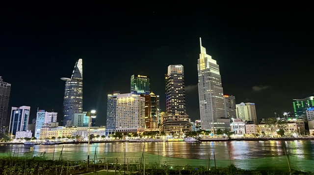 Ho Chi Minh City skyline at night, seen from the Thu Thiem urban area in Thu Duc city, offering a spectacular view of the high-altitude fireworks show on April 30, 2024. Photo courtesy of Vietnam News Agency.