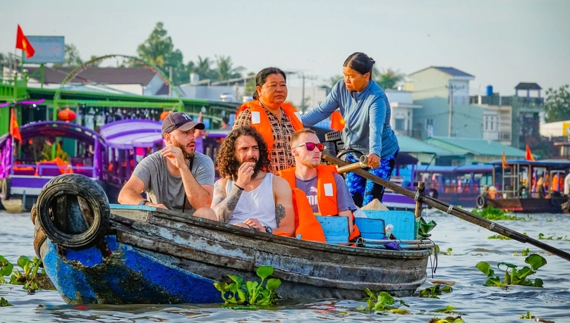 Foreign visitors in Can Tho city, Vietnam's Mekong Delta. Photo courtesy of Thanh Nien (Young People) newspaper.