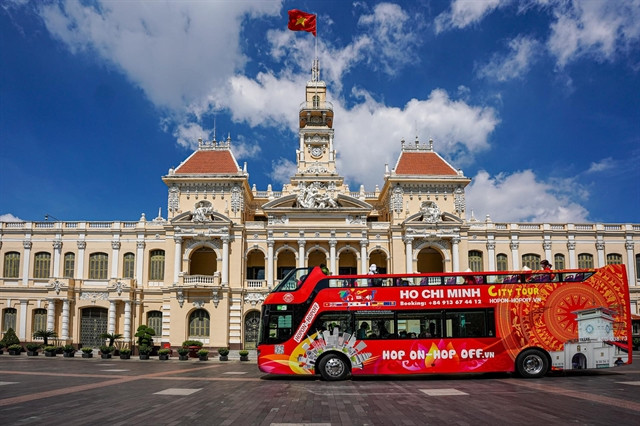 Hop-on hop-off city sightseeing tour is a famous activity in HCMC. Photo courtesy of halotravel.vn