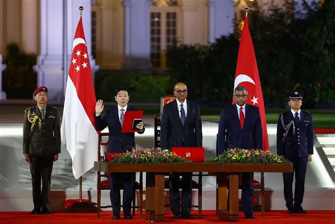 Lawrence Wong ( second, from left) takes his oath of office as Singapore's fourth Prime Minister on May 15, 2024. Photo courtesy of AFP.