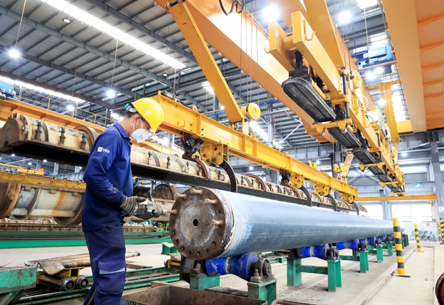 A worker performs product inspection at an FDI factory in Ba Ria-Vung Tau province, southern Vietnam. Photo courtesy of Vietnam News Agency.