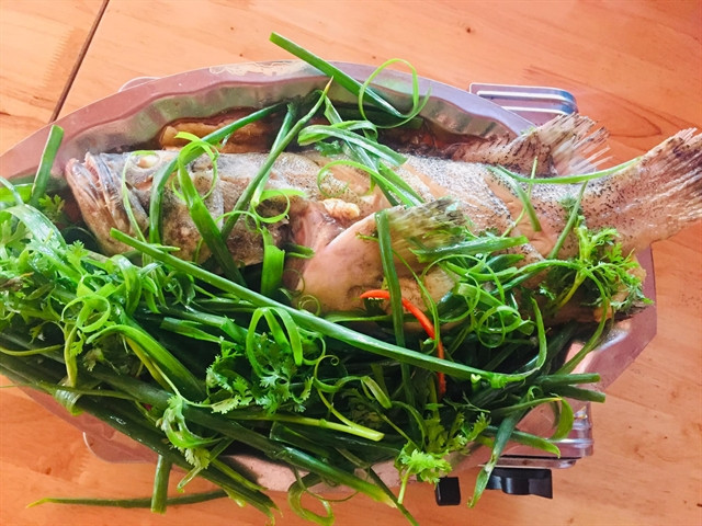 Steamed grouper is among the most popular dishes on Phu Quy Island, Binh Thuan province, south-central Vietnam. Photo courtesy of taucaotoc.vn