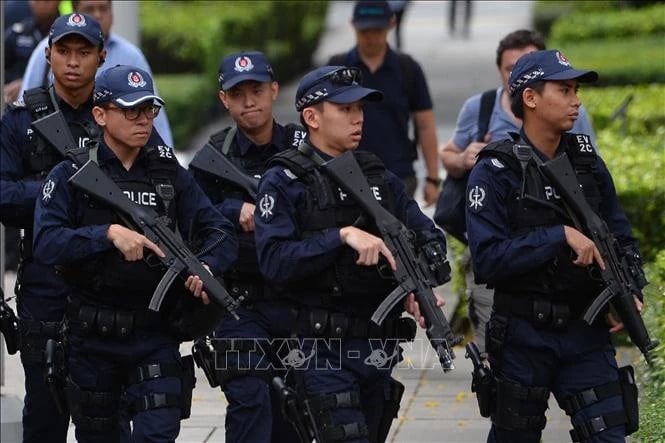 Police increase security in many areas in Singapore. Photo courtesy of AFP.