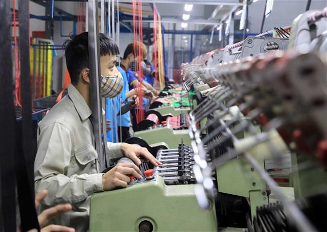 Workers during a shift at a packaging factory in Hung Yen province, northern Vietnam. Photo courtesy of Vietnam News Agency.