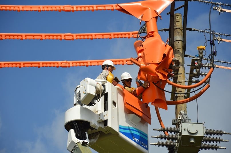 EVN workers conduct maintenance work on a power system. Photo courtesy of EVN.