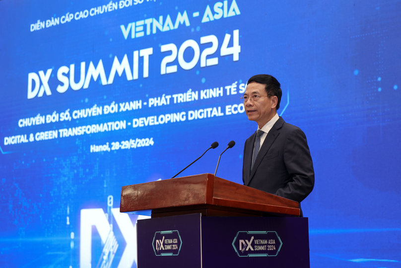 Minister of Information and Communications Nguyen Manh Hung speaks at the DX Summit 2024 in Hanoi, May 28, 2024. Photo courtesy of Vinasa.