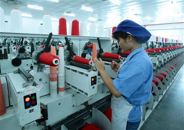 A yarn production line at Chinese-invested Jasan Vietnam Company in Hung Yen province, northern Vietnam. Photo courtesy of Vietnam News Agency.