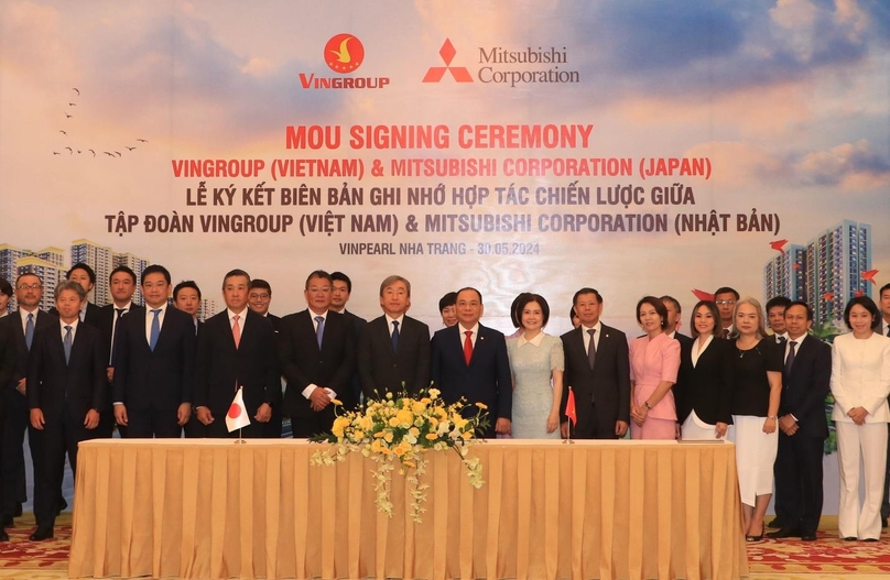 Pham Nhat Vuong (red tie), chairman of Vingroup, attends an MoU signing ceremony between Vingroup and Mitsubishi Corporation in Khanh Hoa province, central Vietnam, May 30, 2024. Photo courtesy of Vingroup.