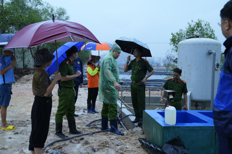 Police in Phu My town, Ba Ria-Vung Tau province, southern Vietnam check wastewater storage at a waste treatment facility run by Kbec Vina on May 30, 2024. Photo courtesy of Cong An Nhan Dan (People’s Police) newspaper.