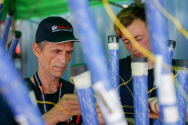  Italian members finalize the preparation of fireworks for the team's performance on the second night of the Danang International Fireworks Festival on June 15, 2024. Photo courtesy of DIFF 