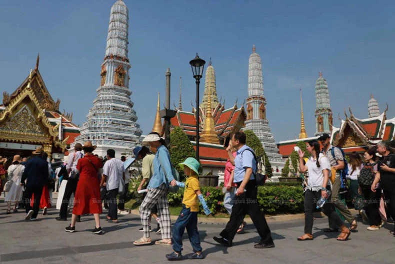  Tourists walk towards Wat Phra Kaeo inside the Grand Palace, which remains one of Thailand’s leading tourist attractions. Photo courtesy of Bangkok Post.