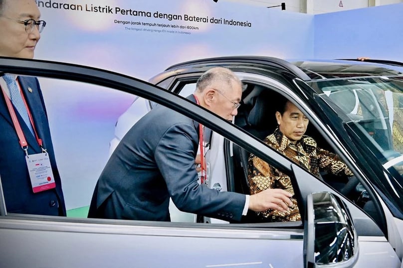 Indonesian President Joko Widodo (right) speaks with Hyundai Motor Group executive chairman Chung Eui-sun (center) during an inspection of the battery and electric vehicle manufacturing plant by PT Hyundai LG Indonesia-Green Power in Karawang, West Java. Photo courtesy of AFP/Indonesian Presidential Palace.