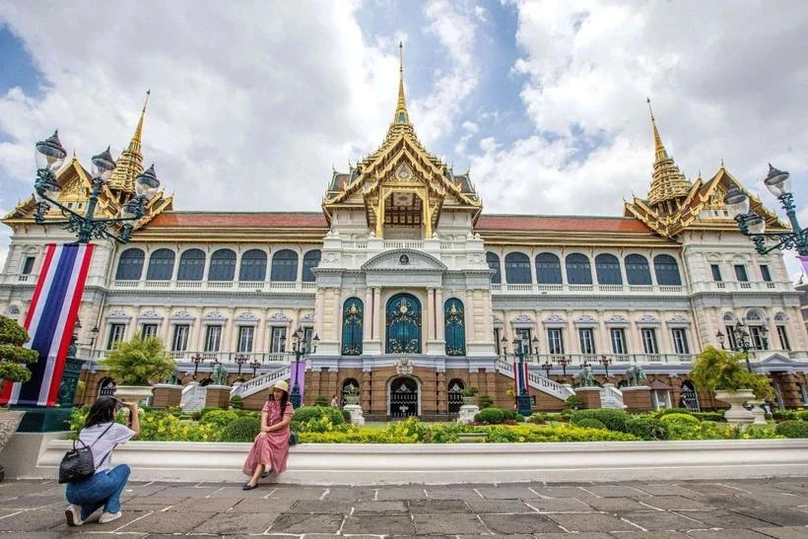 Tourists visit the Grand Palace in Bangkok. Photo courtesy of Xinhua.