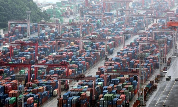  Shipping containers are stacked at a port in Busan, South Korea. Photo courtesy of koreatimes.co.kr.