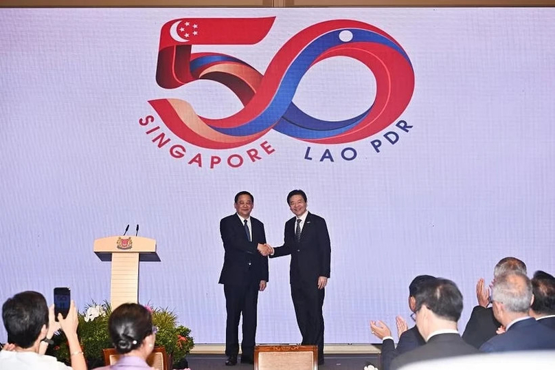 Singaporean PM Lawrence Wong (right) and his Lao counterpart Sonexay Siphandone. Photo courtesy of Straitstimes.