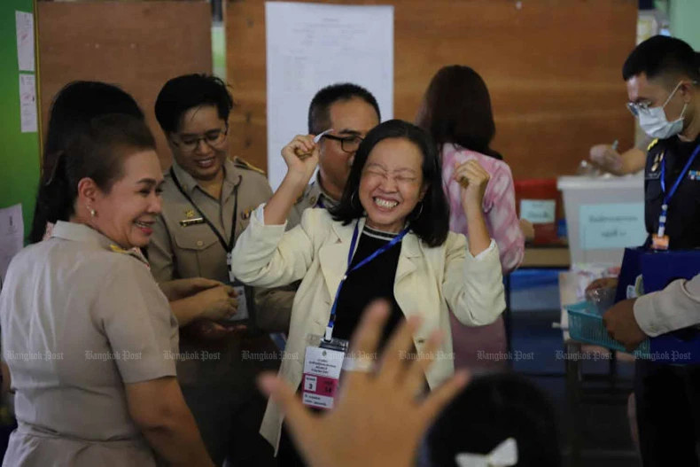 A candidate for the Senate expresses joy at a polling station in Bang Kapi district of Bangkok after hearing she passed the first round of the Senate election on June 9, 2024. Photo courtesy of Bangkokpost