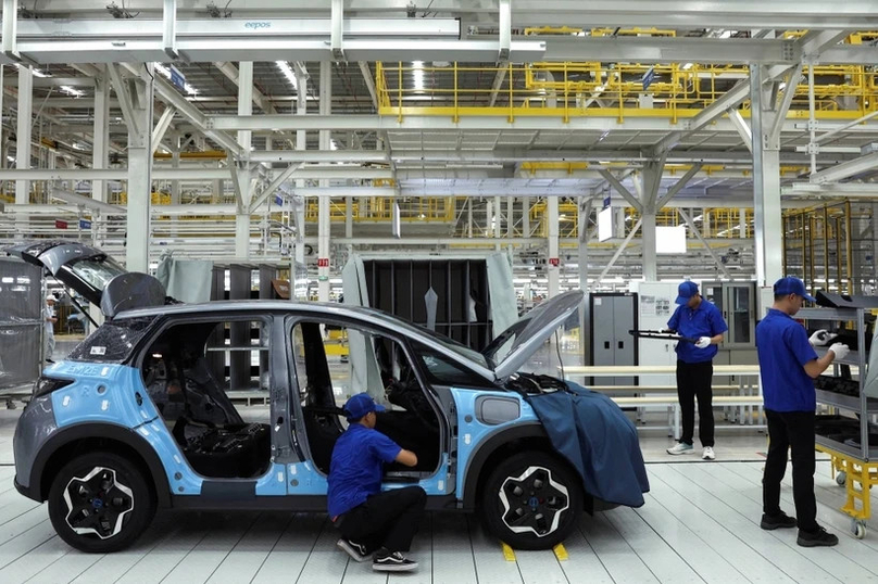 Workers assemble a car inside BYD's first EV factory in Southeast Asia in Rayong, Thailand, July 4, 2024. Photo courtesy of Reuters.